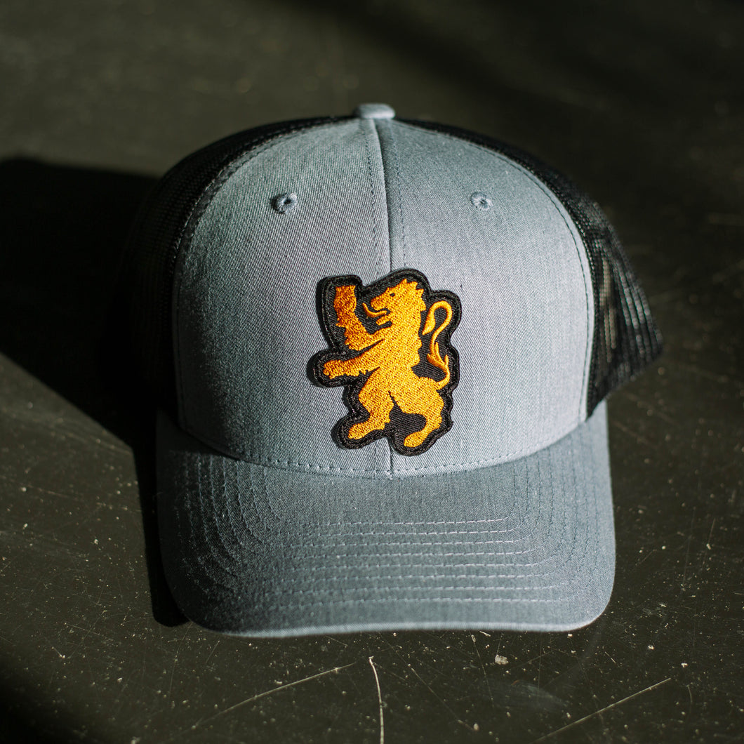 Lion Badge Trucker Hat